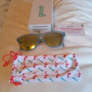 Goodr OG sunbathing with wizards sunglasses